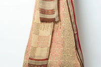 Eleganct Suit with Geometric and Floral Patterns Adorned with an Artistic Dupatta