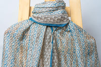 Handwoven Stole with Geometric and Wave Motifs, Crafted with Natural Dyes and Borders