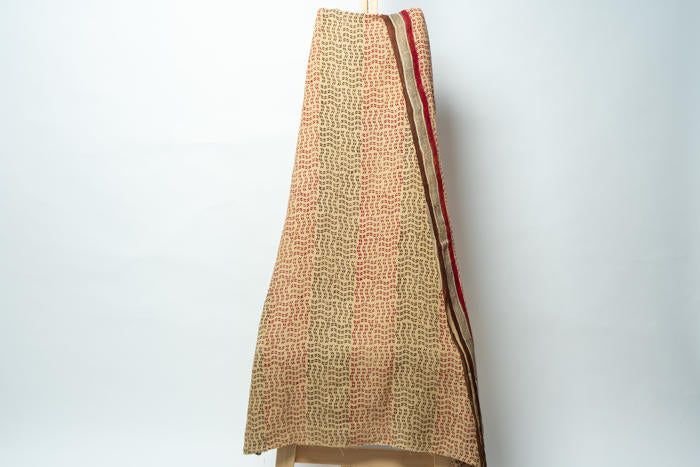 Eleganct Suit with Geometric and Floral Patterns Adorned with an Artistic Dupatta