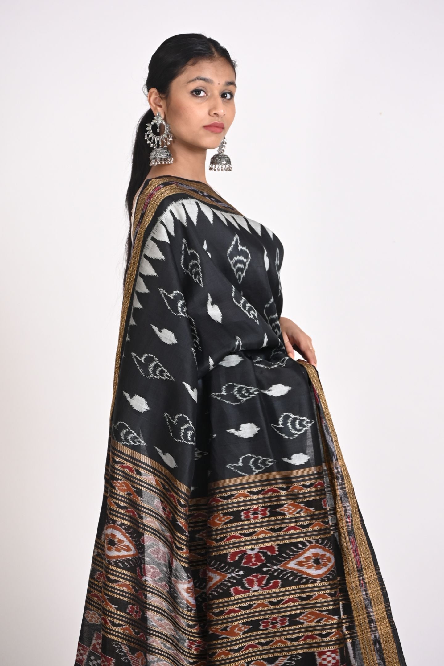 Handloom Black Ikat Silk Saree with Sankha Design