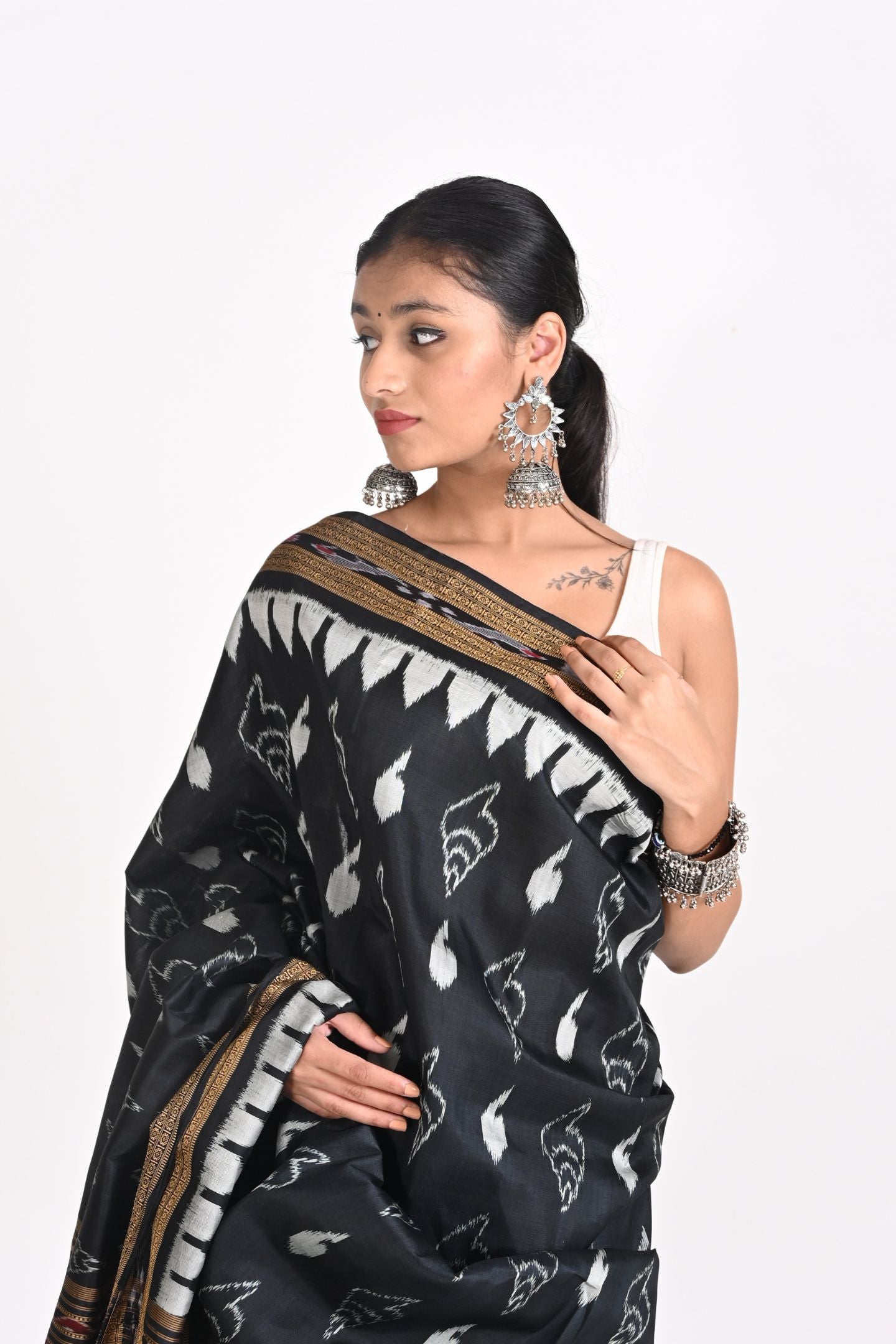 Handloom Black Ikat Silk Saree with Sankha Design
