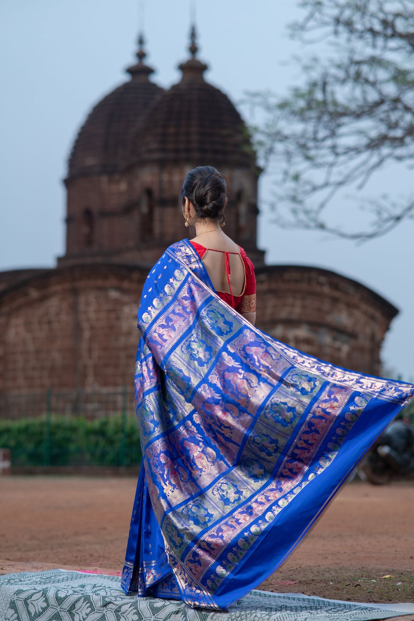 Pure Silk Blue Baluchari Saree with Mythological Figures and Buti Work