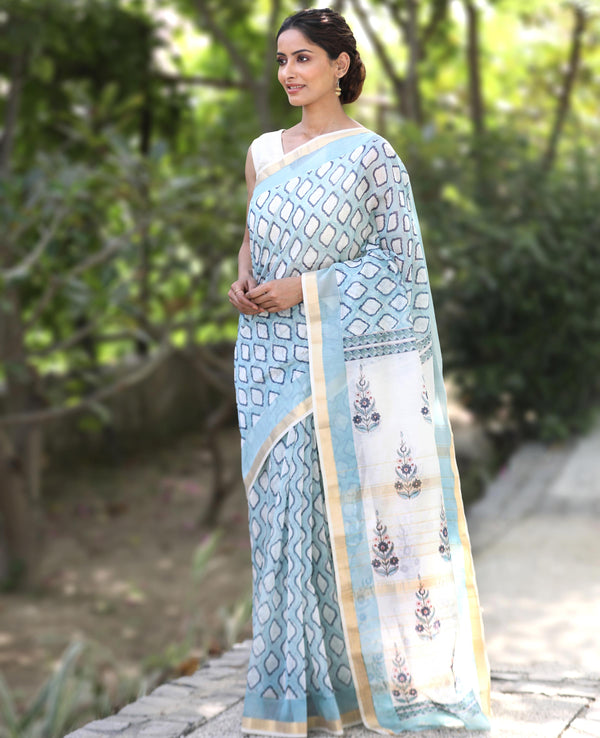 Sky blue and white pallu and floral handblock printed Maheshwari saree with thin gold zari border